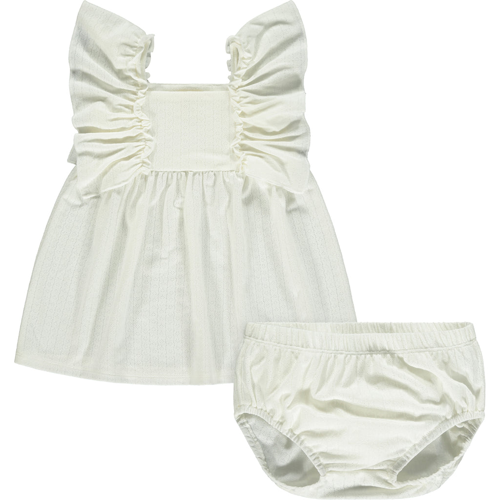 white dress in cotton pointelle jersey with frill over shoulders matching diaper cover pants