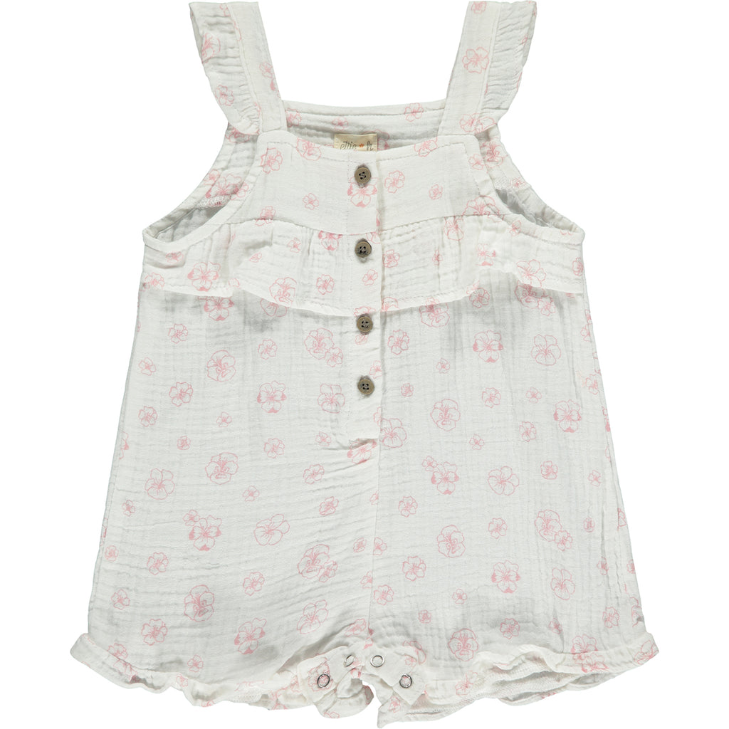 white gauze shortie overall with all over pink flower print. buttons on front and frill detail round front and legs