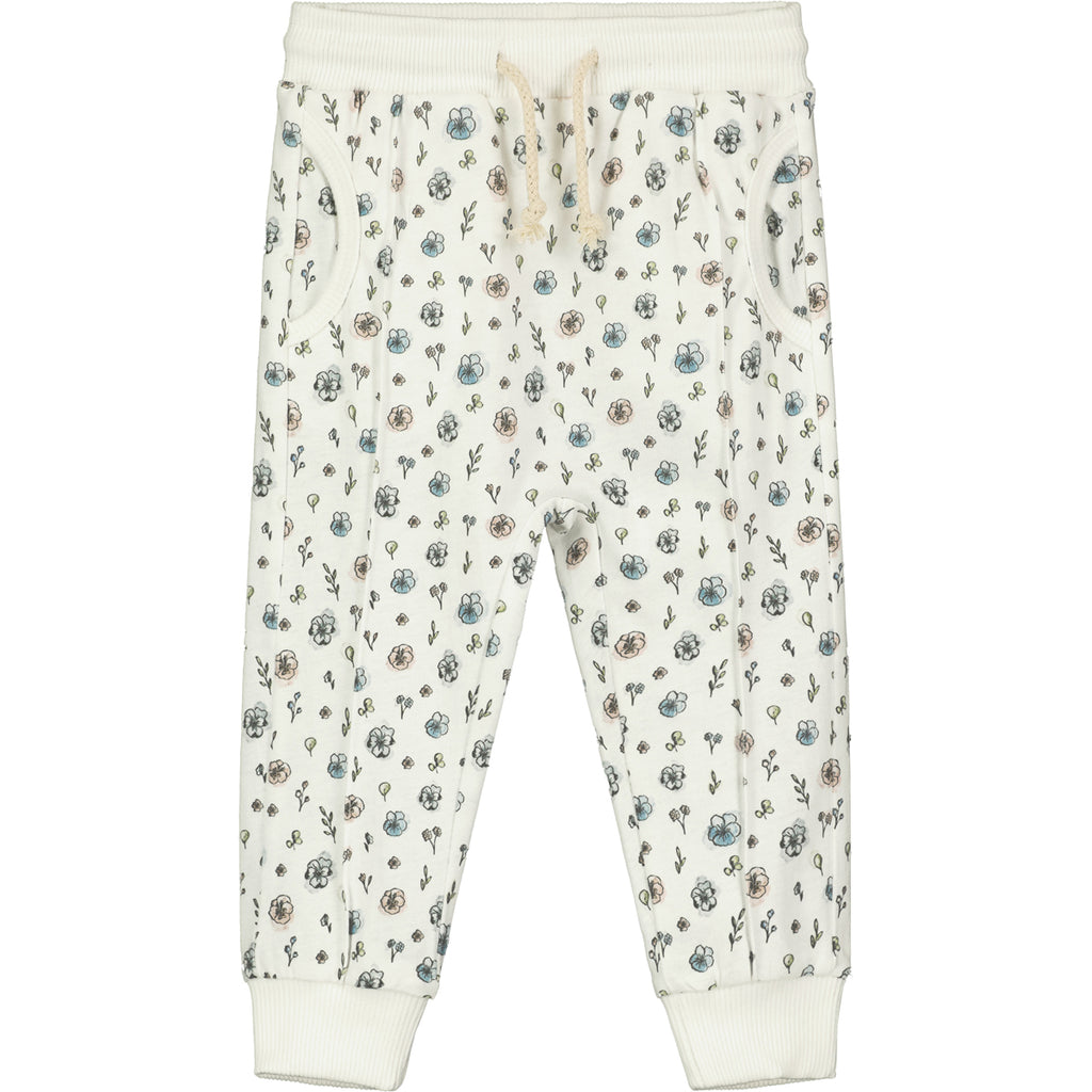 white flower print joggeres with elastic waistband and drawcord side pockets and front seam detail 