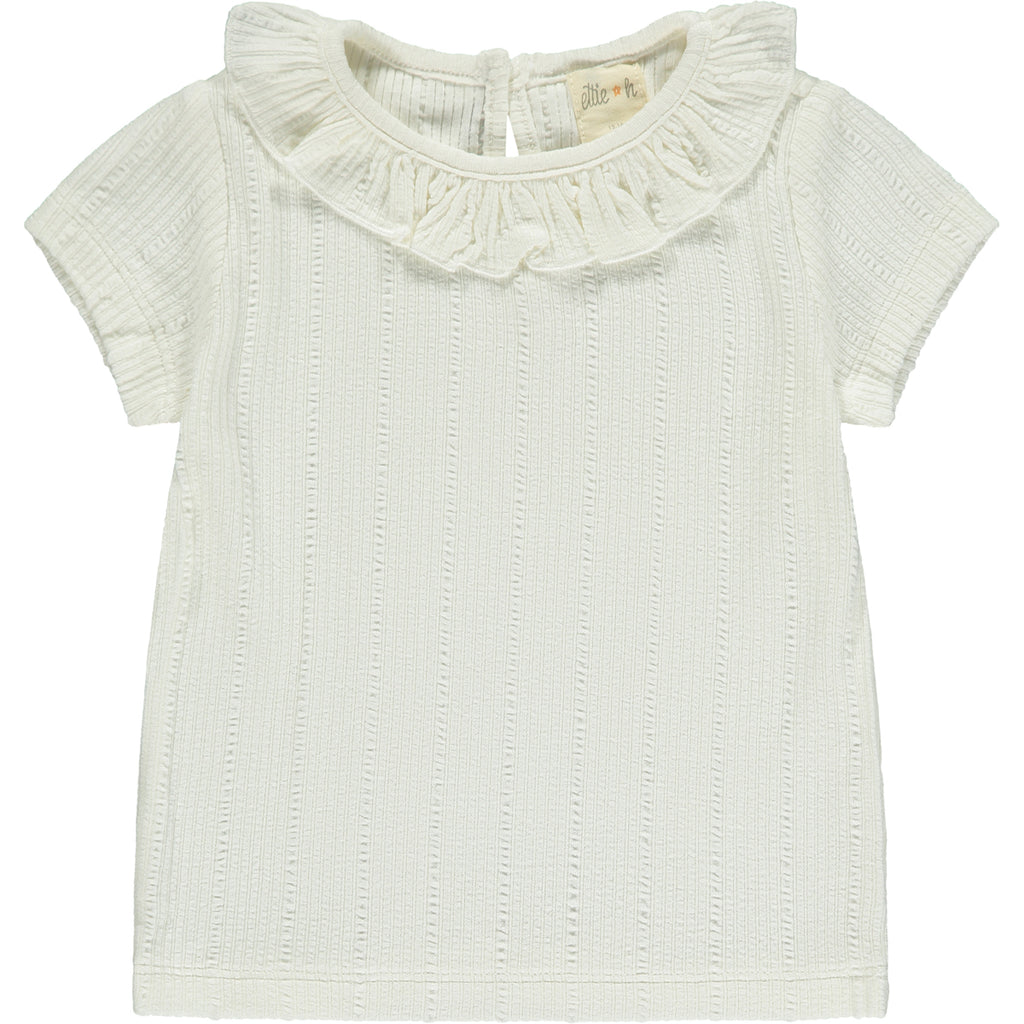 white tee shirt with patterned fabric and frill neck 
