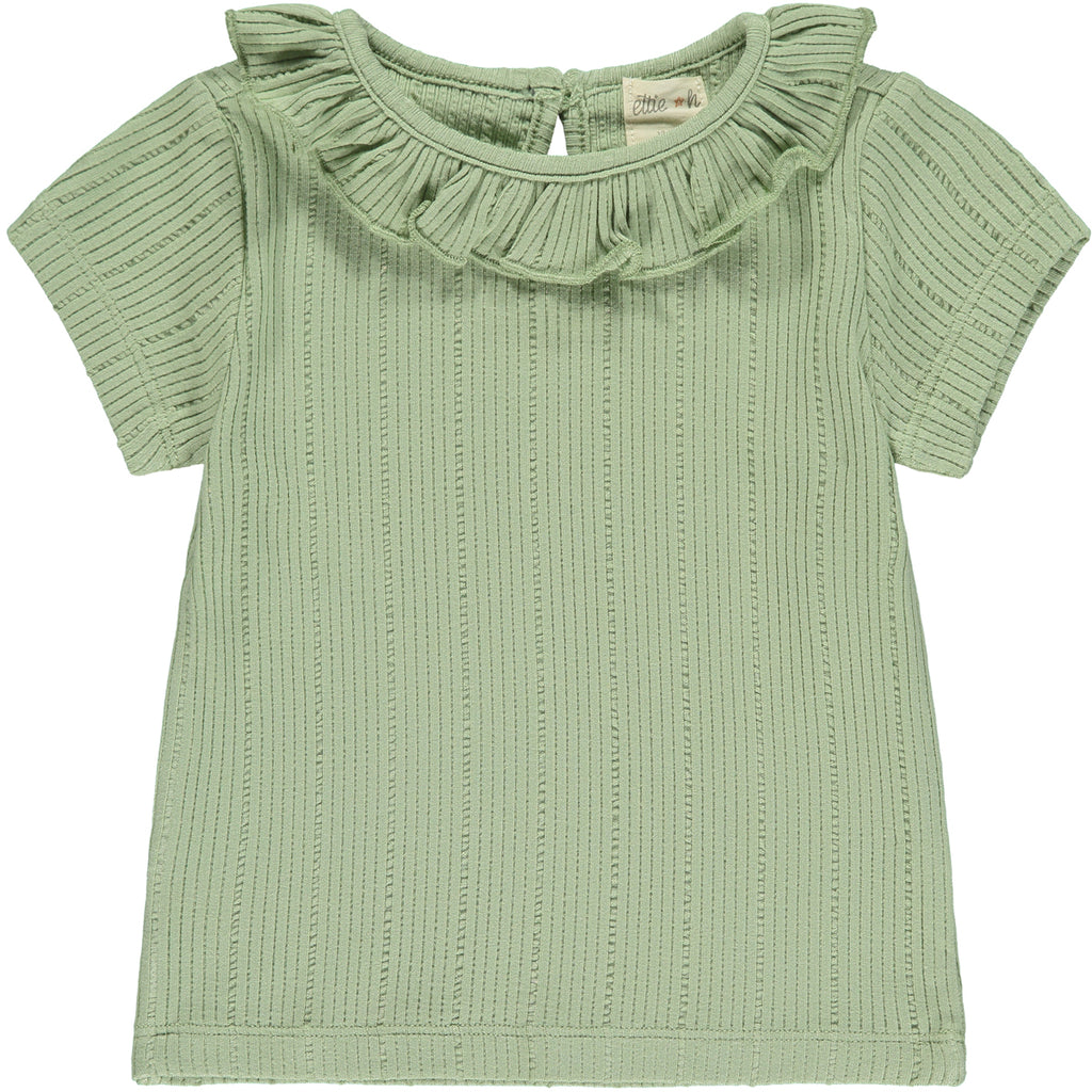 green tee shirt with patterned fabric and frill neck