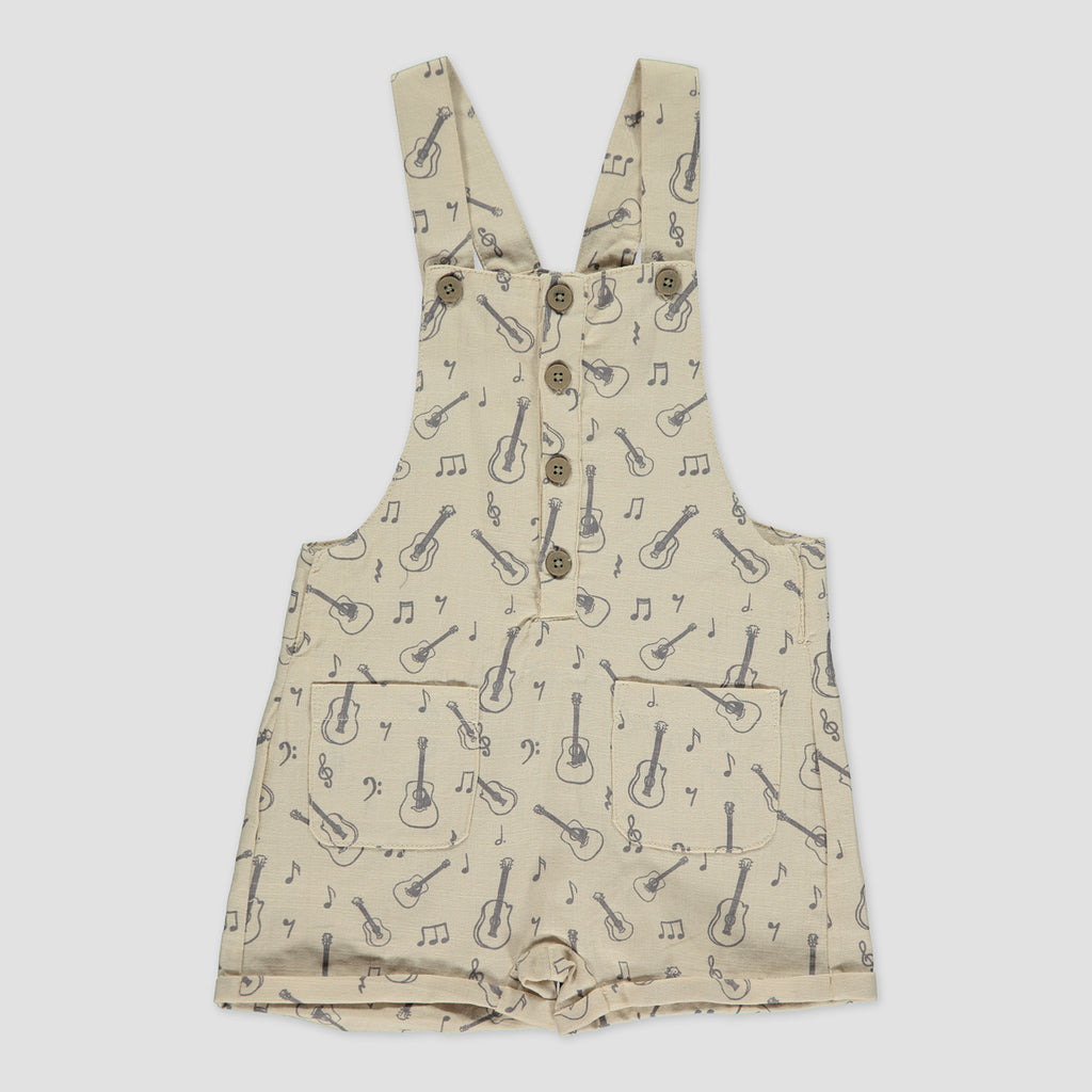 cream overalls with buttons down the front 2 patch pockets and guitar print all over