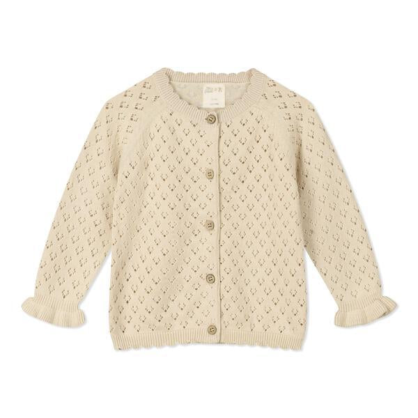 cream knit cardigan with pretty pattern, scalloped edge around the neck and the bottom and cute frill cuffs with a gentle stretch wrist band. Buttons down the front.