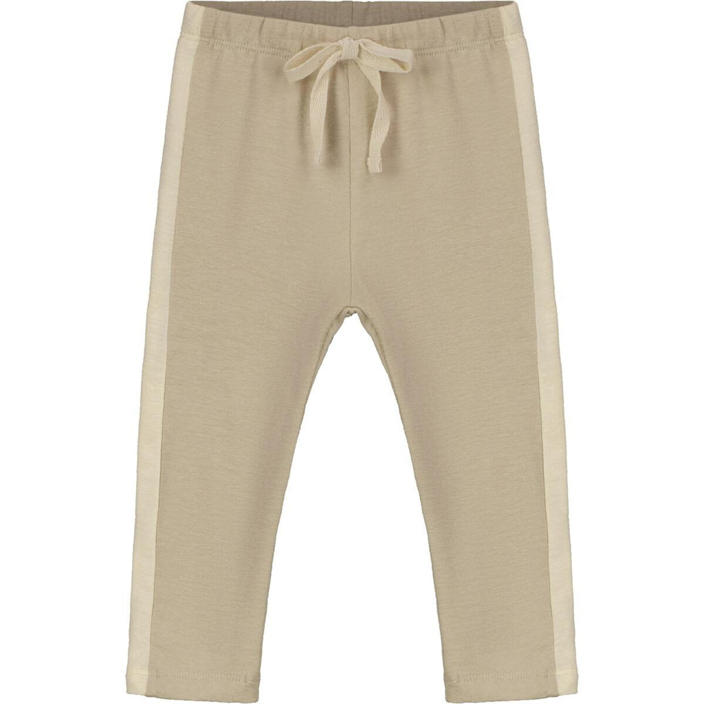 oatmeal jersey pants with cream cord at waist and cream stripes down side of legs