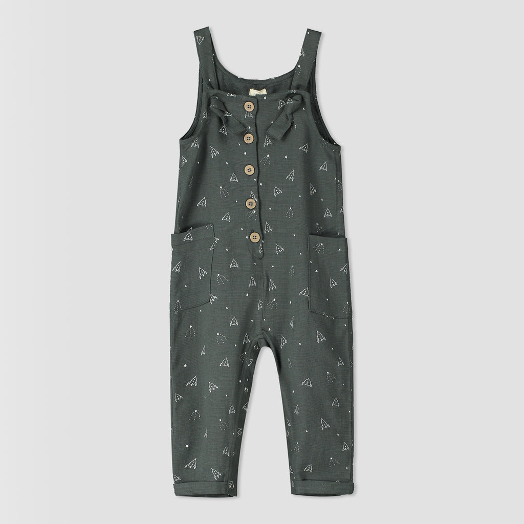 grey overalls with rocket all over print. knotted straps and buttons down the front bib. patch pockets at side
