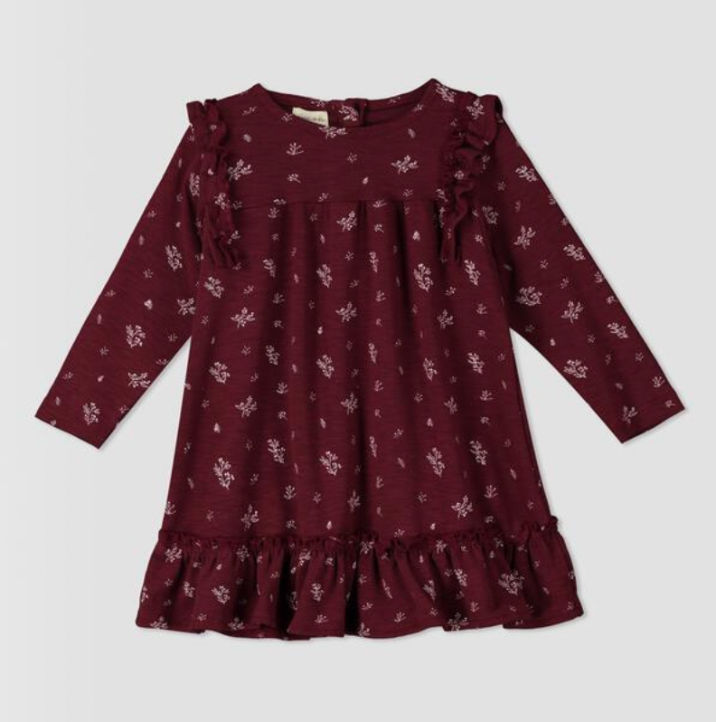 burgundy dress with ruffle shoulders and long sleeves ruffle frill around the bottom small flower print in white all over