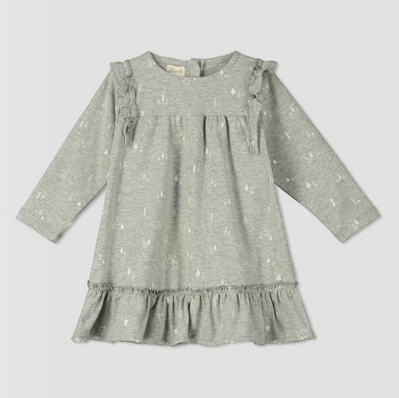 pale grey dress with tree print with ruffle shoulders and long sleeves ruffle frill around the bottom